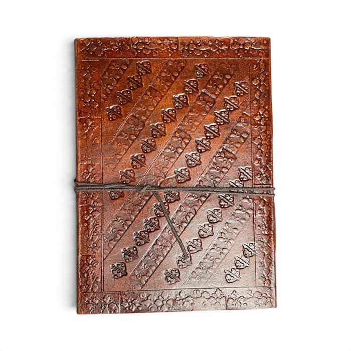 Carnets en cuir reliés à la main – motifs gaufrés chargés de sens