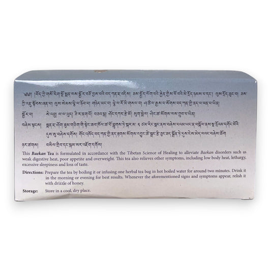 Detailaufnahme Sorig Baekan Tea Kraeuter Tee Verpackung und Teebeutel