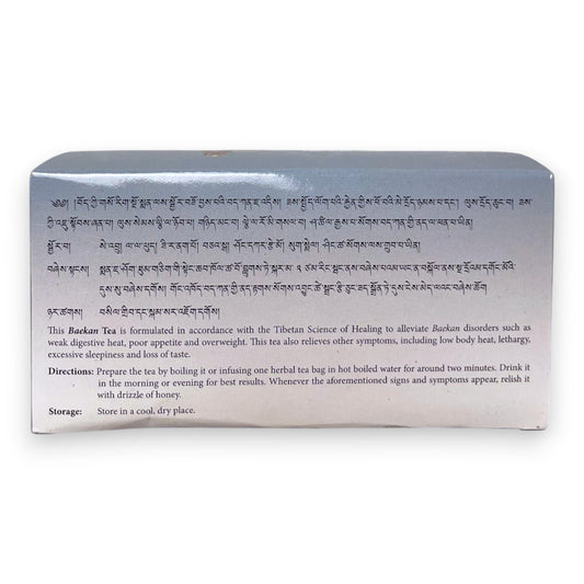 Detailaufnahme Sorig Baekan Tea Kraeuter Tee Verpackung und Teebeutel