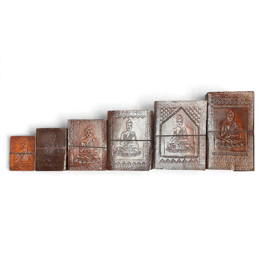 Buddha leather journals in 6 sizes side by side – from 8 × 10.5 cm to 14 × 23 cm