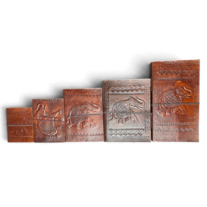 Elephant leather journals in 5 sizes side by side – from 8 × 10.5 cm to 13.5 × 23 cm