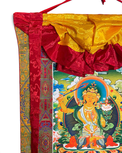 Thangka Manjushri, détail du haut avec tablier de soie jaune et cordon de suspension rouge