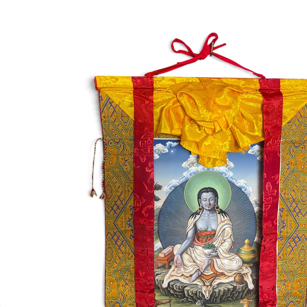 Milarepa thangka, top detail with yellow silk apron and hanging cord