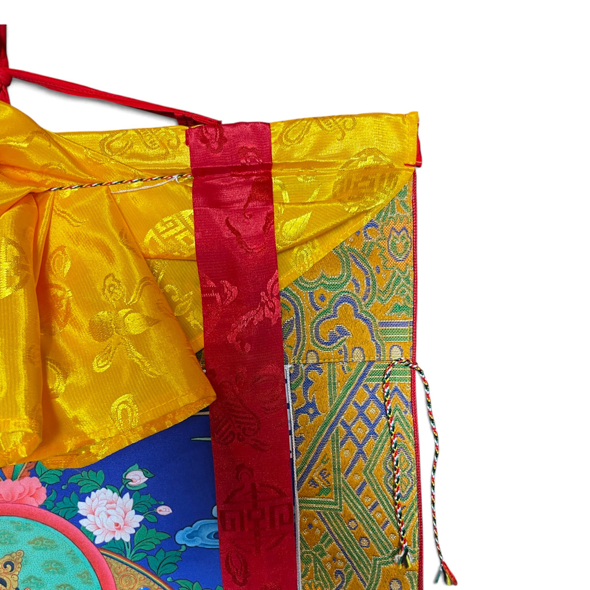 Thangka Dzambhala, détail du tablier de soie et du cordon de suspension – Himalaya Vibes