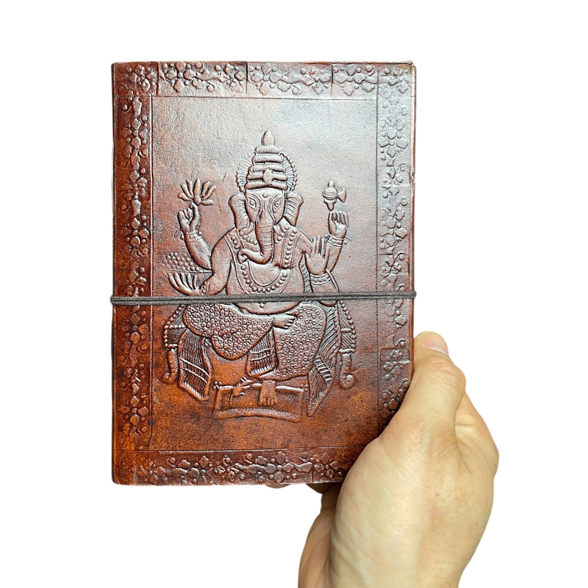 Ganesha leather journal in hand – size comparison, Himalaya Vibes Bern