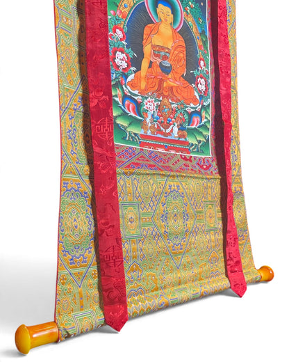 Thangka Bouddha Shakyamuni, détail du bas avec barre et brocart jaune