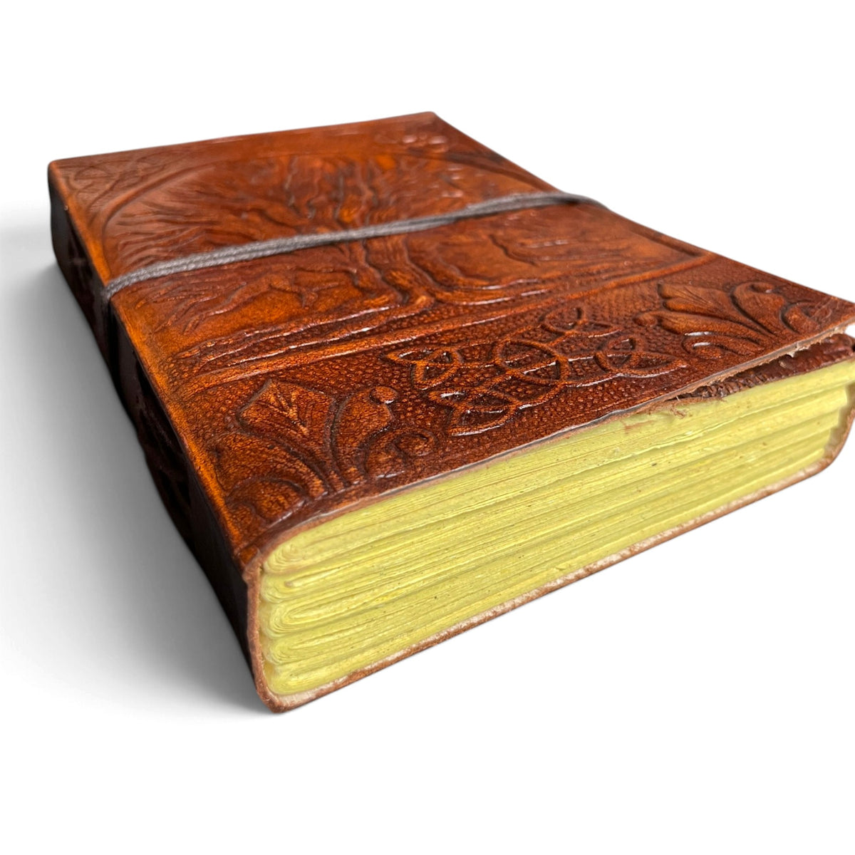 Tree of Life journal side view – thick paper block with irregular edges and wrap cord