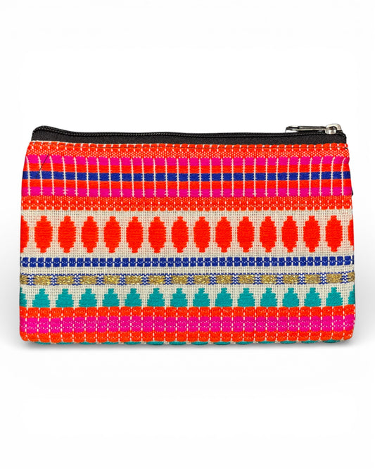 Farbfrohe gewebte Kosmetiktasche im Ethno-Stil mit pinken, roten und blauen Mustern – Himalaya Vibes Bern.