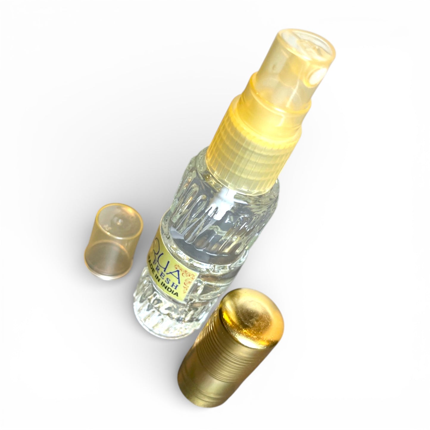 Geoeffnetes Aqua Fresh Parfuem Spray mit goldener Kappe Tibet Laden Schweiz