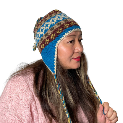 „Manaslu“ – Handgestrickte Nepal-Mütze petrol