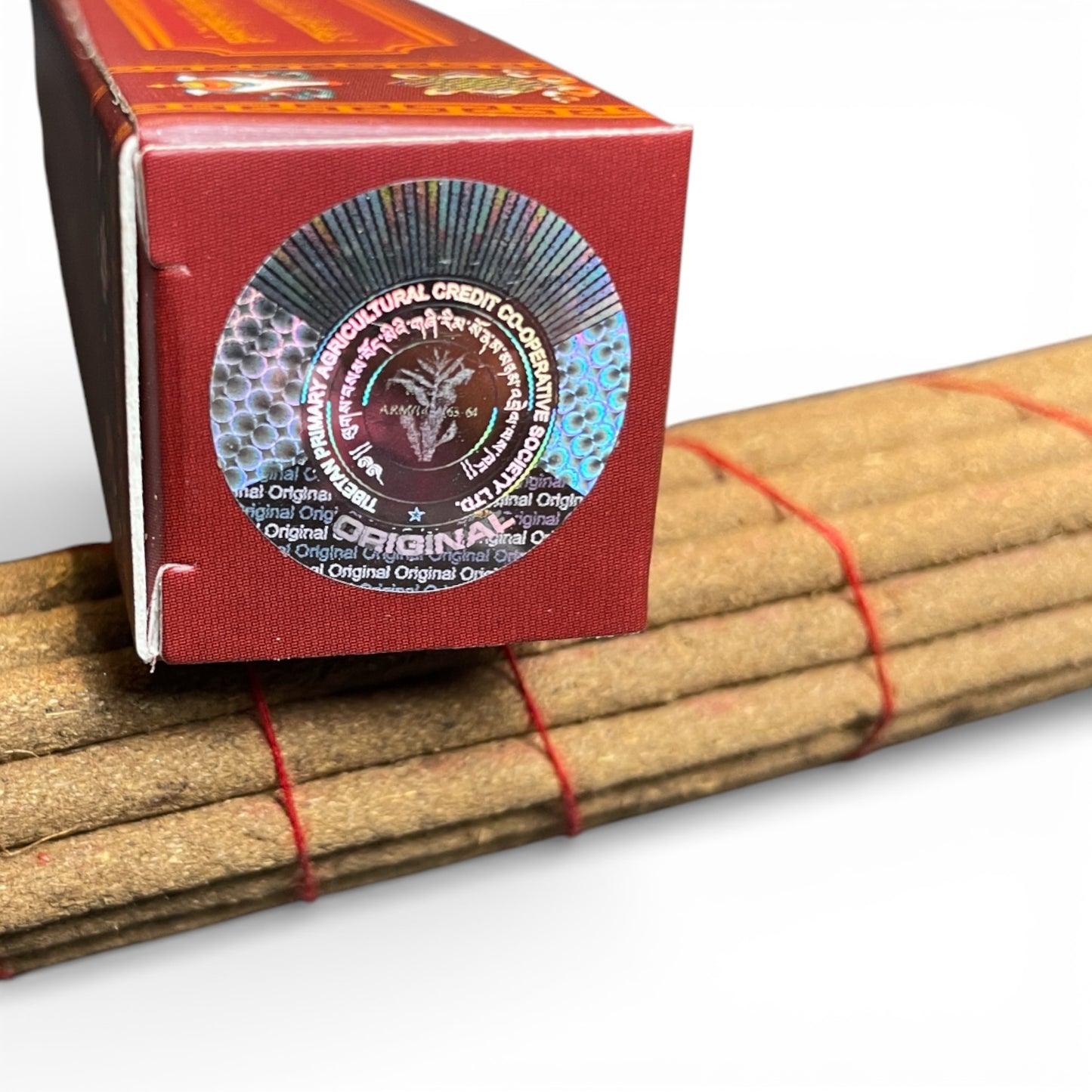 Nahaufnahme des Hologramm-Siegels der "Tibetan Primary Agricultural Credit Co-operative Society" zur Bestätigung der Originalität.