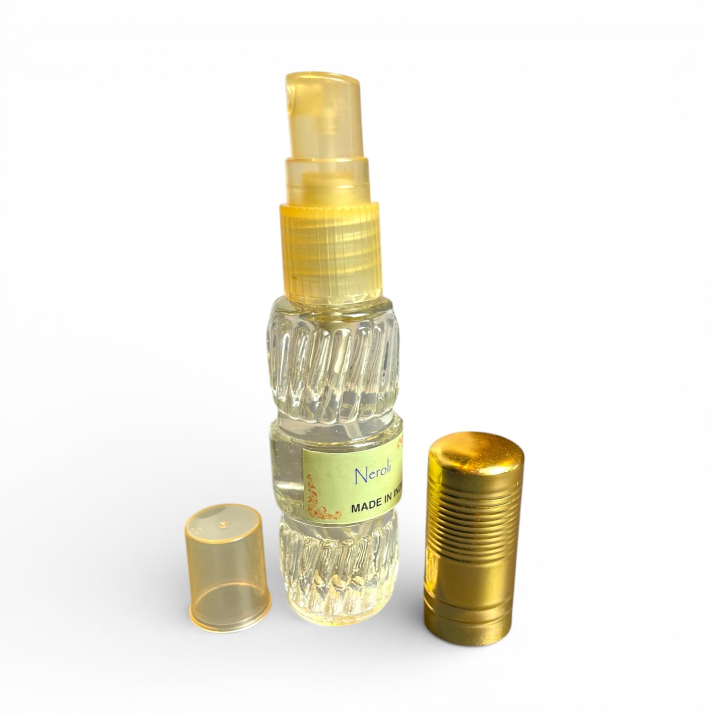 Neroli Spray Parfuem geoeffnet mit goldener Verschlusskappe und Spruehkopf