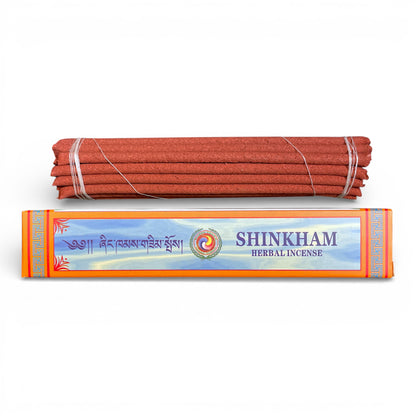 Shinkham Herbal Incense – Tibetische Räucherstäbchen in orangefarbener Verpackung von Himalaya Vibes Bern.