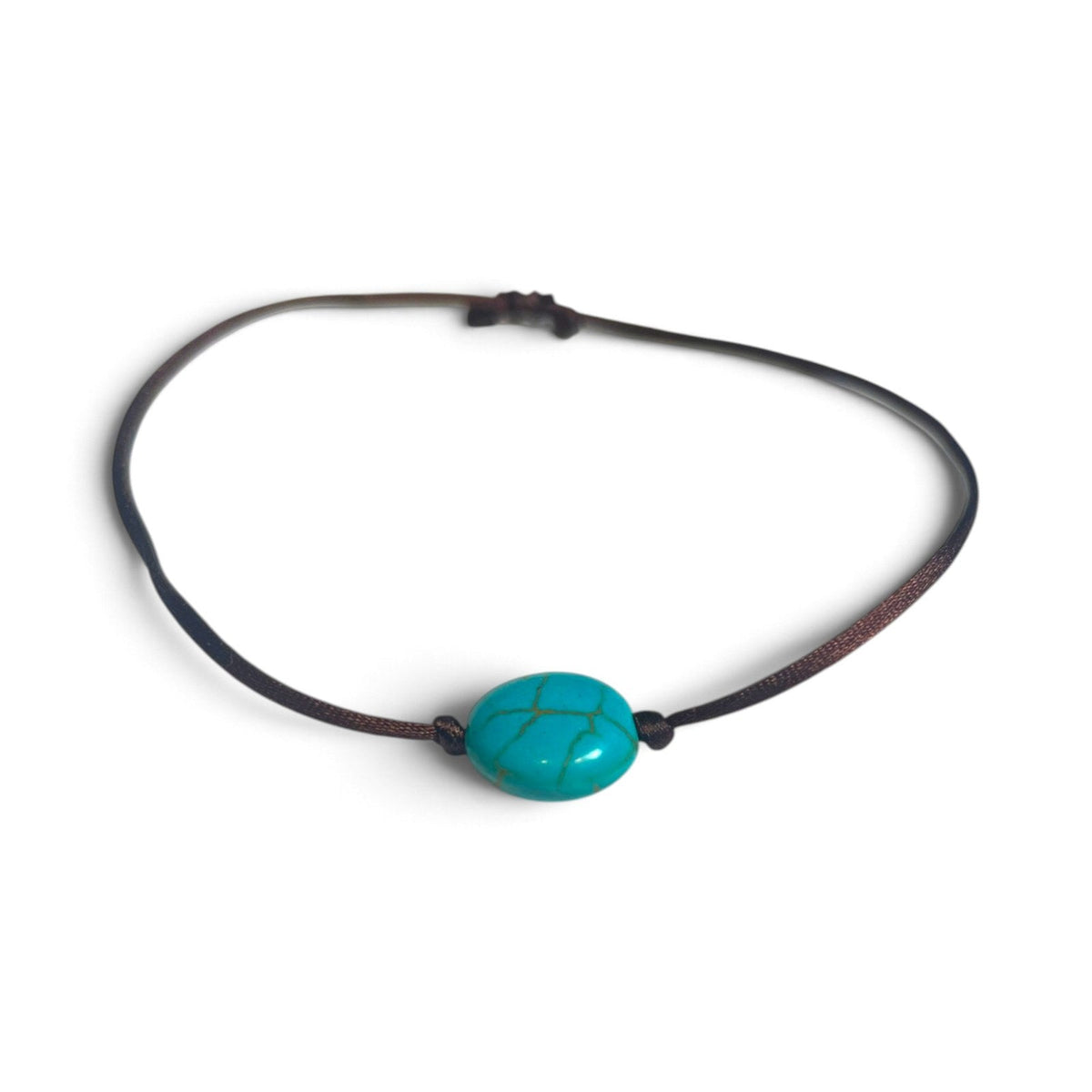 Bracelet porte-bonheur fait main brun avec perle bleu turquoise de Kunsang
