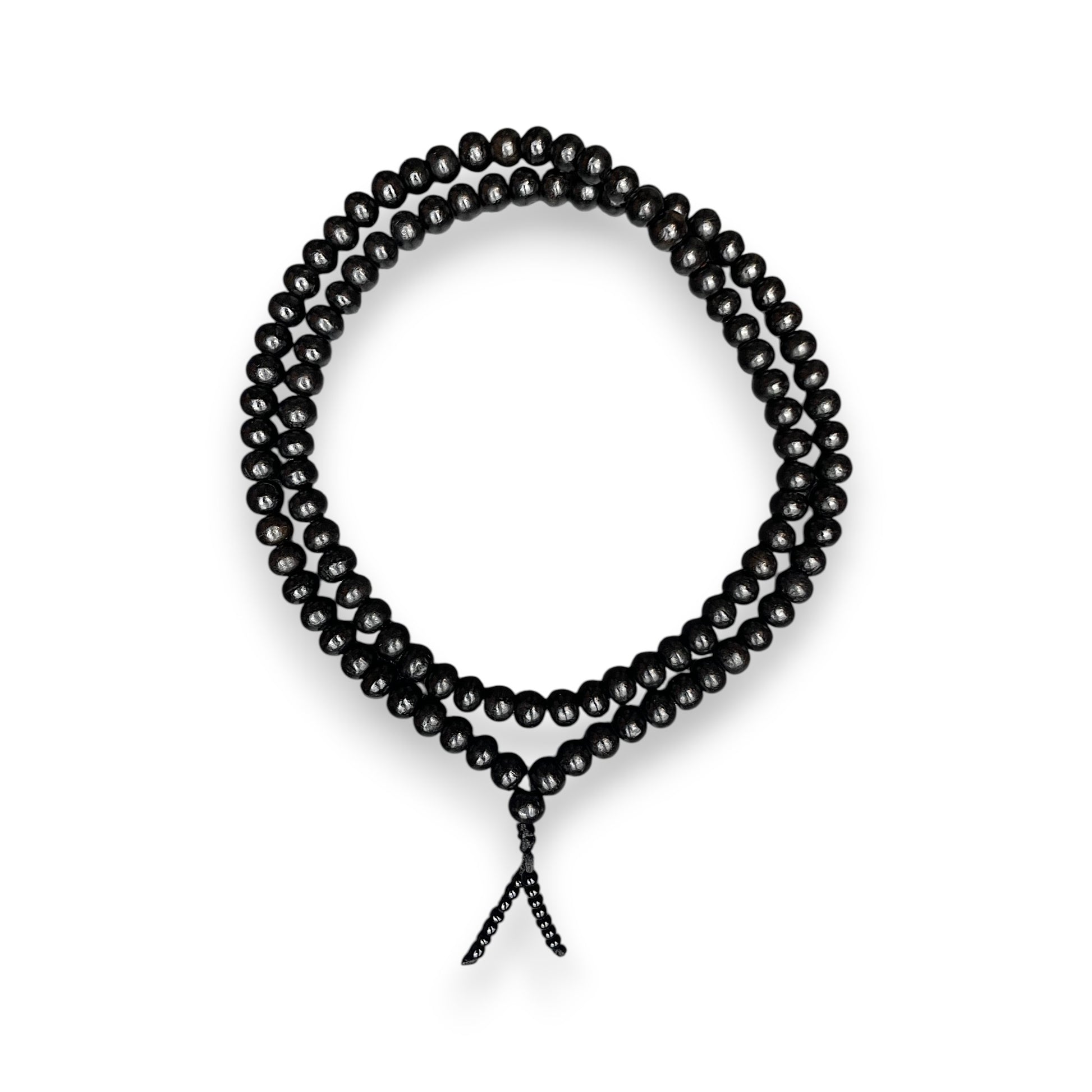 Ebenholz Mala 108 Perlen 6mm – schwarze Holz Mala Kette als Kreis gelegt, Himalaya Vibes Bern
