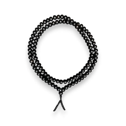 Ebenholz Mala 108 Perlen 6mm – schwarze Holz Mala Kette als Kreis gelegt, Himalaya Vibes Bern
