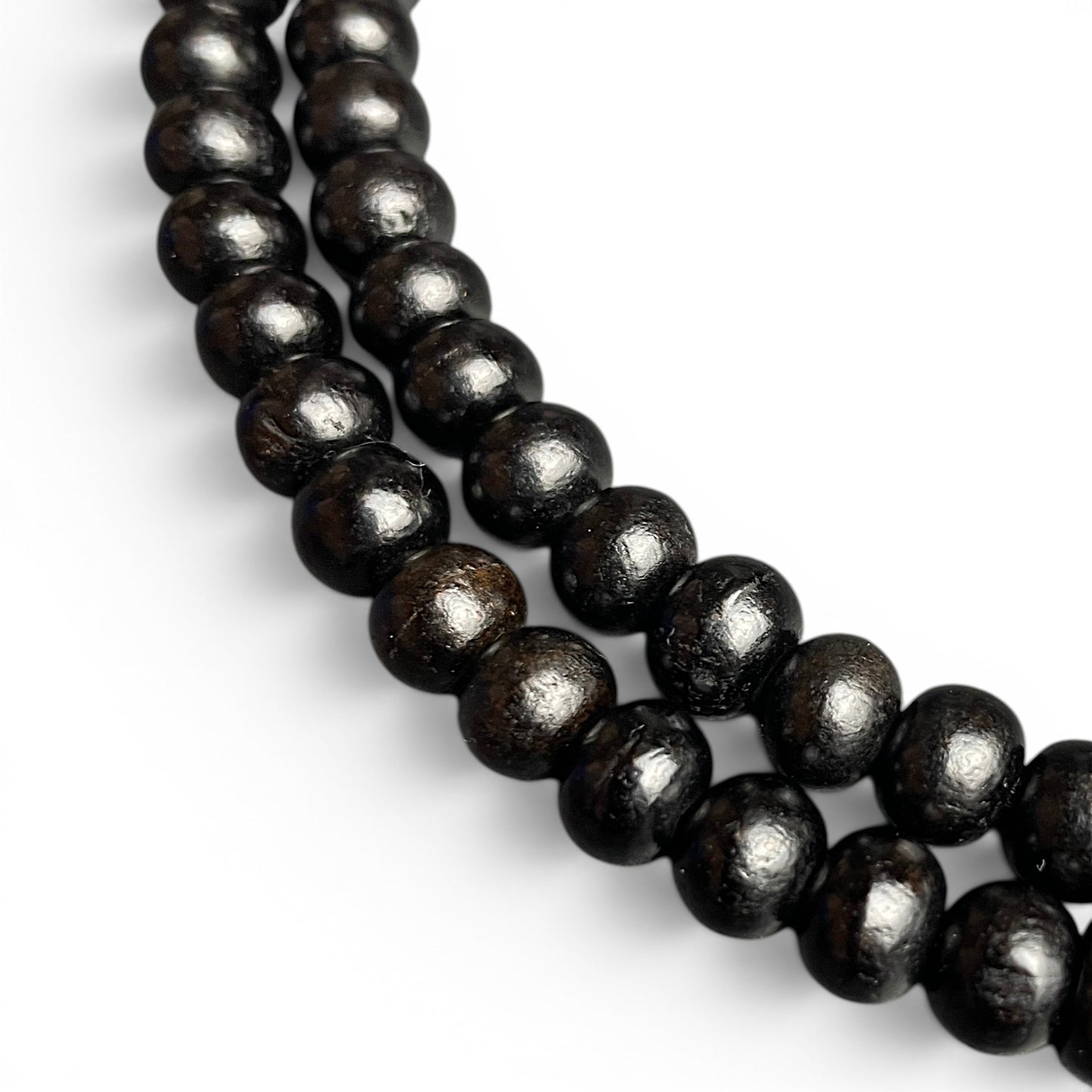 Ebenholz Mala Nahaufnahme – natürliche Holzmaserung schwarze Perlen 6mm, Mala Kette Bern