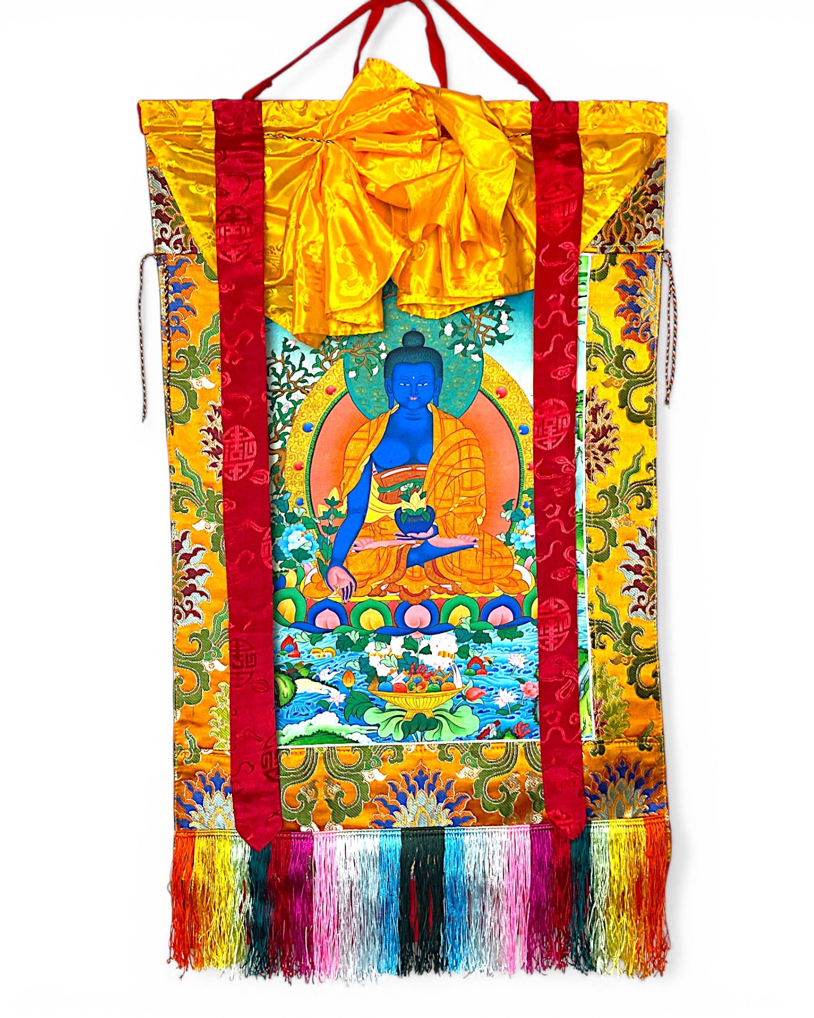 Medizin-Buddha Thangka Rollbild aus Seide und Brokat im Himalaya Vibes Shop Bern.