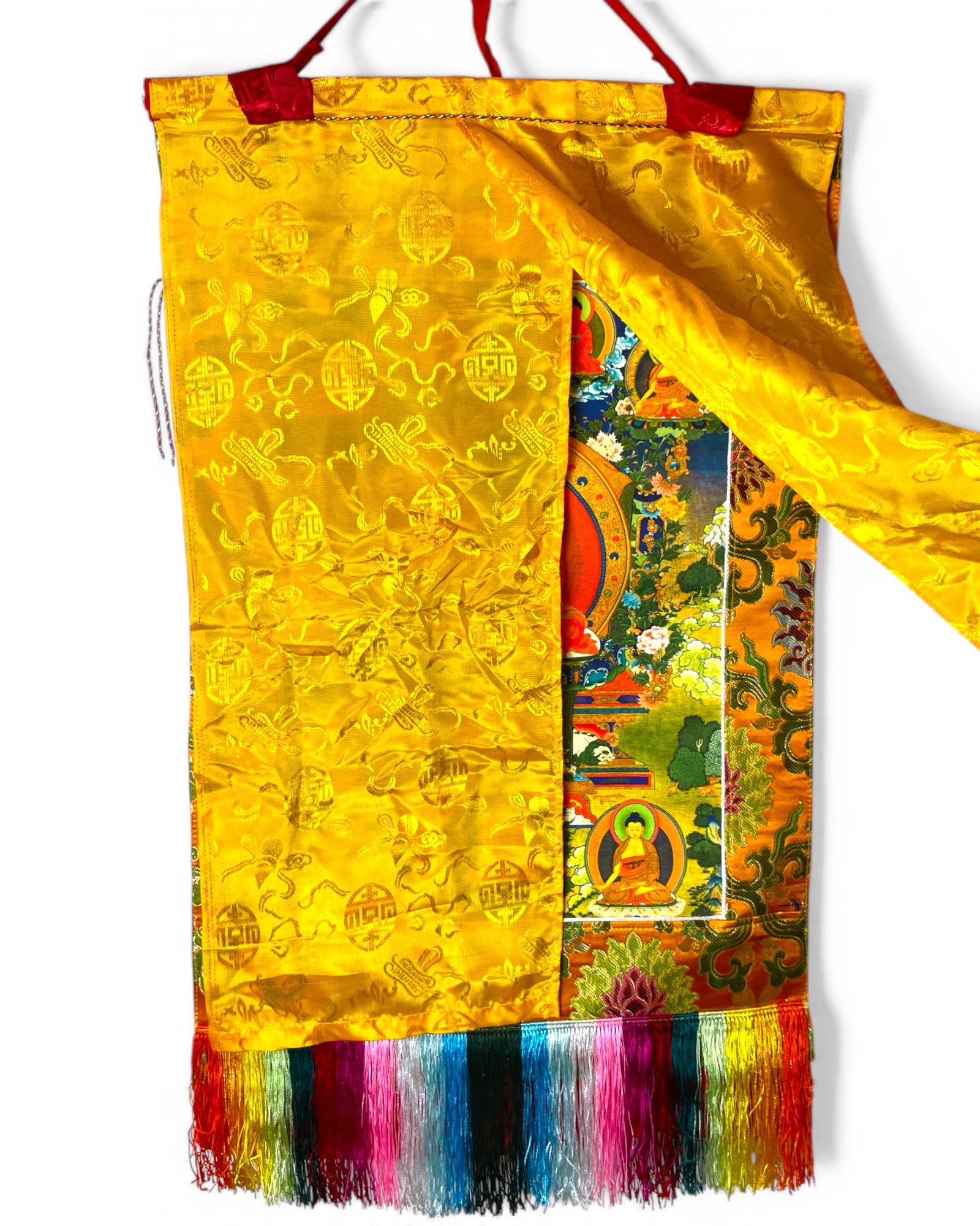 Medizin-Buddha Thangka mit teilweise geöffnetem gelben Schutzvorhang.