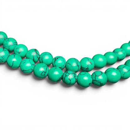 Türkis Howlith Mala Perlen Nahaufnahme – natürliche dunkle Maserung 8mm, Mala Kette Schweiz